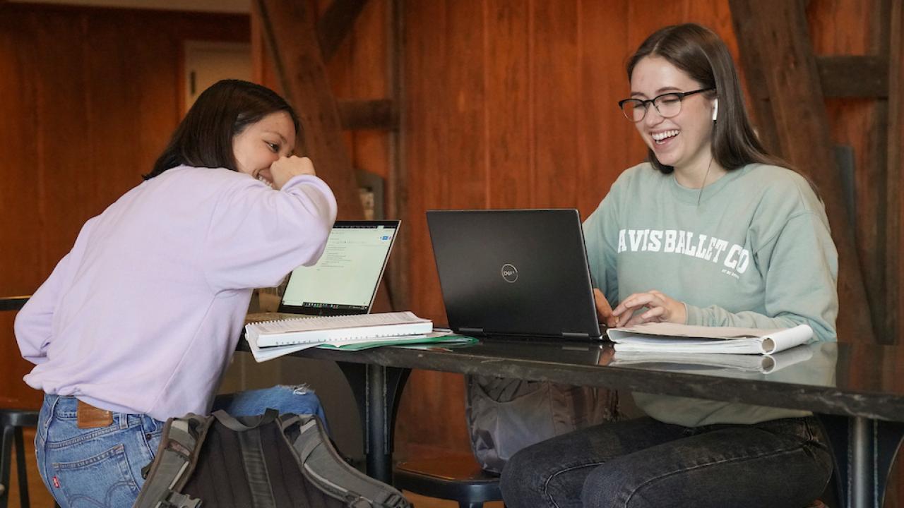 Photo of students on laptops